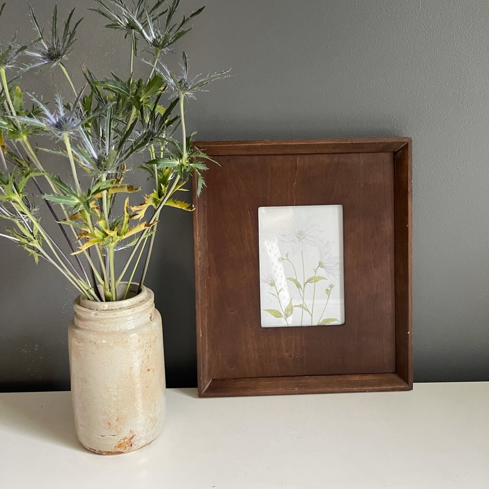 Floral art in walnut frame